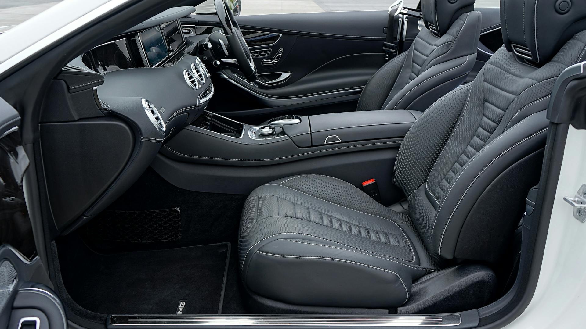 Premium leather interior of a luxury airport transfer vehicle